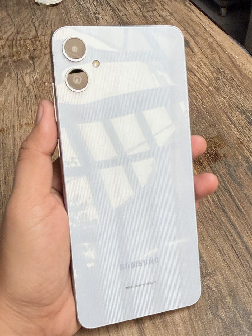Samsung A05 (Category: Samsung) located in Manila. Submitted by mightyriver-db31de (Listing ID 1458493703, Image 3). Description: SAMSUNG GALAXY A05 FOR SALE 💰 Selling Price: ₱3,500 ✅ Working for calls & texts ✅ Wi-Fi working ✅ Charging port already repaired ✅ Good for basic use, messaging, social media, YouTube, etc. ⚠️ HONEST DISCLOSURE: • Has history of repair— charging port was repaired. • Mobile data is NOT working, so Wi-Fi connection is r
