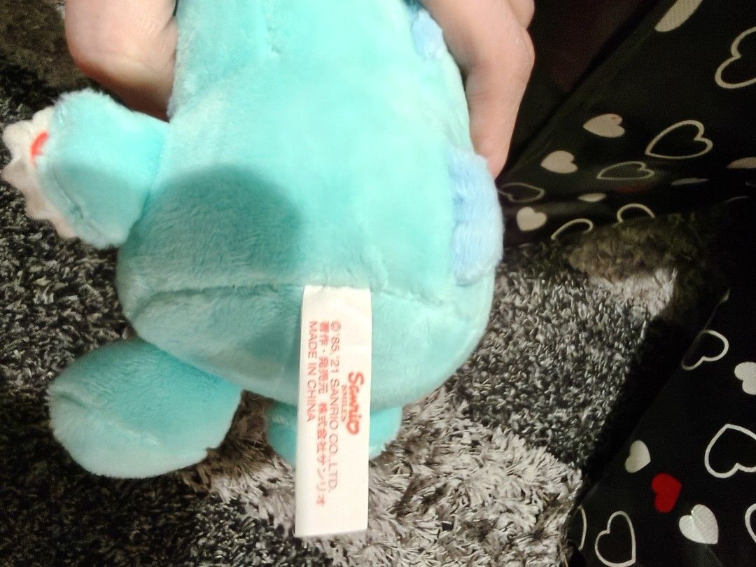 Sanrio Hangyodon (Category: Character Goods) located in Pasay City. Submitted by biancabee25 (Listing ID 1458395271, Image 3). Description: Sanrio Hangyodon from Japan pasabuy on hand with light stain on eye due to storage with paper tag.