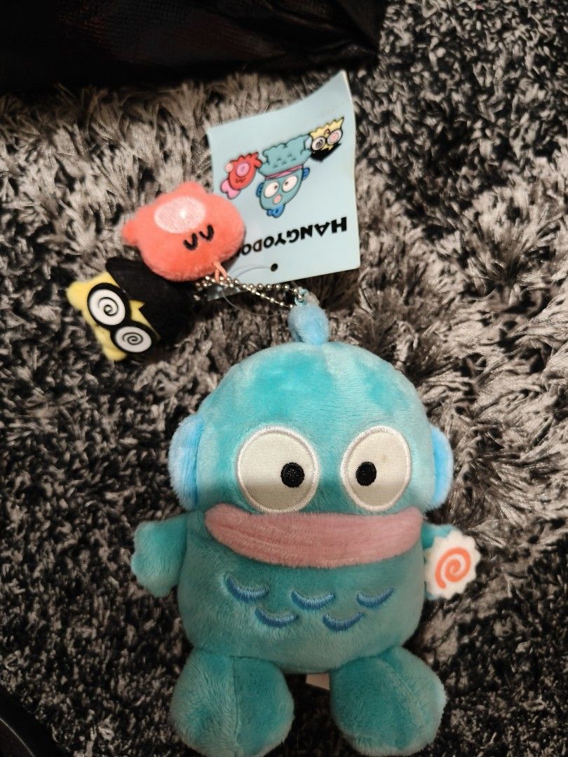 Sanrio Hangyodon (Category: Character Goods) located in Pasay City. Submitted by biancabee25 (Listing ID 1458395271, Image 1). Description: Sanrio Hangyodon from Japan pasabuy on hand with light stain on eye due to storage with paper tag.