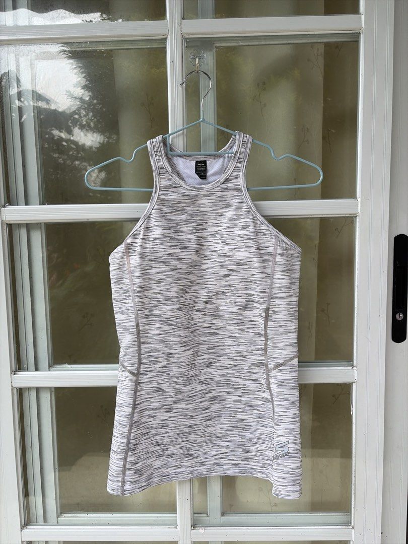 Scelido Performance Tank Top Size M (Category: Sleeveless) located in Bulacan. Submitted by aarchive (Listing ID 1458306850, Image 1). Description: - Scelido Performance grey and white marled tank top - Size: Medium (M) - Style: Racerback - Features: Mesh detailing inside - Material: Comfortable and breathable fabric - Ideal for: Workouts or casual wear.