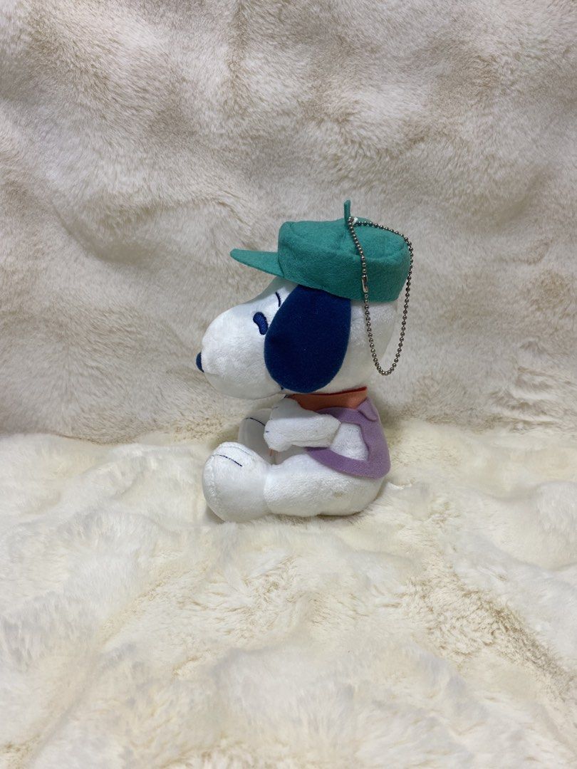 Snoopy Plush Toy with Camera and Green Cap (Category: Plushies & Soft Toys) located in Kalibo. Submitted by ollie_stuffshop (Listing ID 1458423904, Image 2). Description: 17cm x 11cm Before you send your inquiries: ❗️Last Price is already posted ❗️Manage your expectations, WYSIWYG ❗️May need washing ❗️Dropoff is every Wednesday & Sunday - Adorable Snoopy plush toy - Features a green cap and holds a camera - Dressed in a purple vest and orange sca