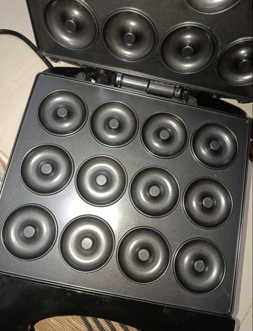 SOKANY Donut Maker - Makes 12 Mini Donuts (Category: Other Kitchenware & Tableware) located in Quezon City. Submitted by janeyme08 (Listing ID 1458392333, Image 2). Description: - SOKANY Donut Maker - Makes 12 mini donuts at once - Non-stick plates for easy release - Indicator lights for readiness - Perfect for quick baking - Simple to clean - Easy to use: just plug in!.