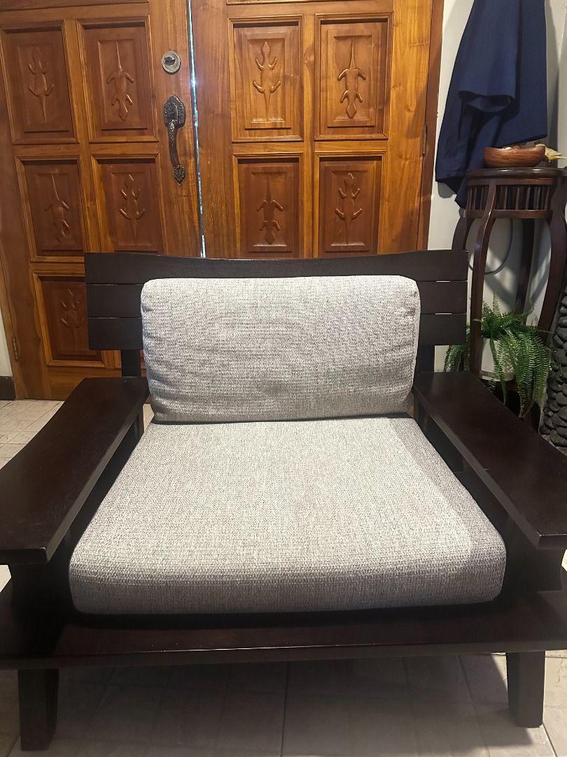Solid Wood Nitori Akatsuki Low Armchair (Category: Sofas) located in Mandaluyong City. Submitted by shortfornatalie (Listing ID 1458437365, Image 1). Description: Low and wide solid wood armchair perfect for Japandi-style homes and long afternoons of reading/crafting. The wide armrests make it so that you don't need a side table to go with the chair as it comfortably sits a mug of coffee and a stack of books. Covers are also removable and washabl