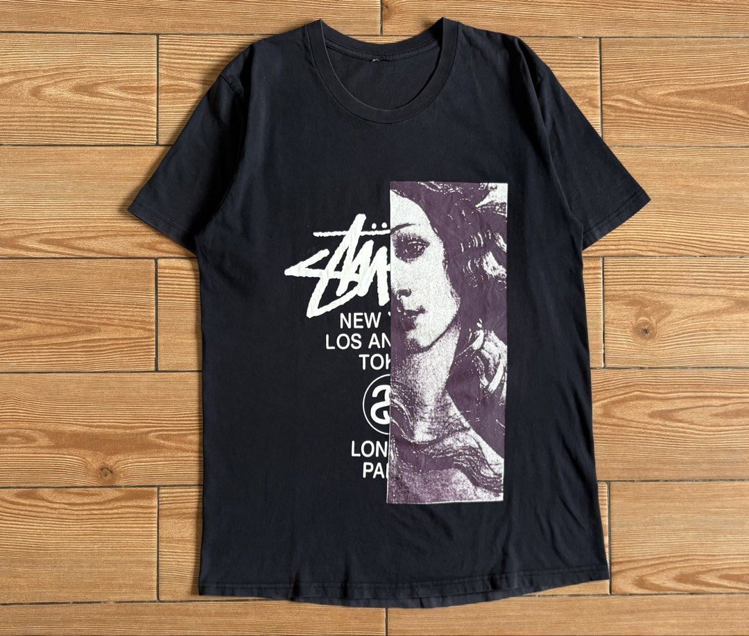 STUSSY WORLD TOUR VENUE TEE (Category: Tshirts & Polo Shirts ) located in Makati City. Submitted by jnc__apparel (Listing ID 1458461739, Image 2). Description: 🏷️ STUSSY WORLD TOUR VENUE TEE 📌 Dimes: 30.5L x 20.5W 📌 Size: Large for men 📌 Condition: Good 📌 Color rate: 8.5/10 📌 Issue: None ✅ Washed and ready to wear .