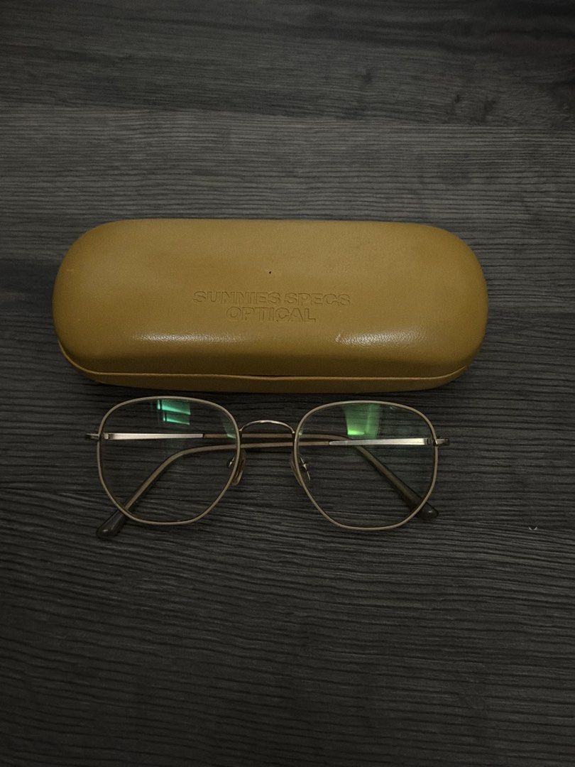 Sunnies Specs Optical Glasses with Case (Category: Sunglasses & Eyewear) located in Manila. Submitted by sushi.lover (Listing ID 1458370603, Image 1). Description: - Includes a tan hard case. - Features a thin metal frame. - Clear lenses. - Ideal for everyday wear..