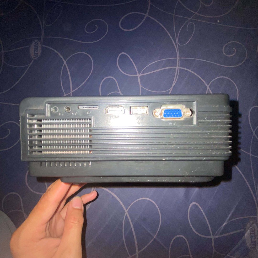 SUNYS Smart Projector (Category: Projectors) located in Manila. Submitted by r_vmvnd (Listing ID 1458461092, Image 2). Description: - SUNYS Smart Projector - Ideal for movie nights and presentations - Connectivity: HDMI, USB, AV, VGA ports - Easy focus and keystone adjustment wheels on top - In excellent working condition.