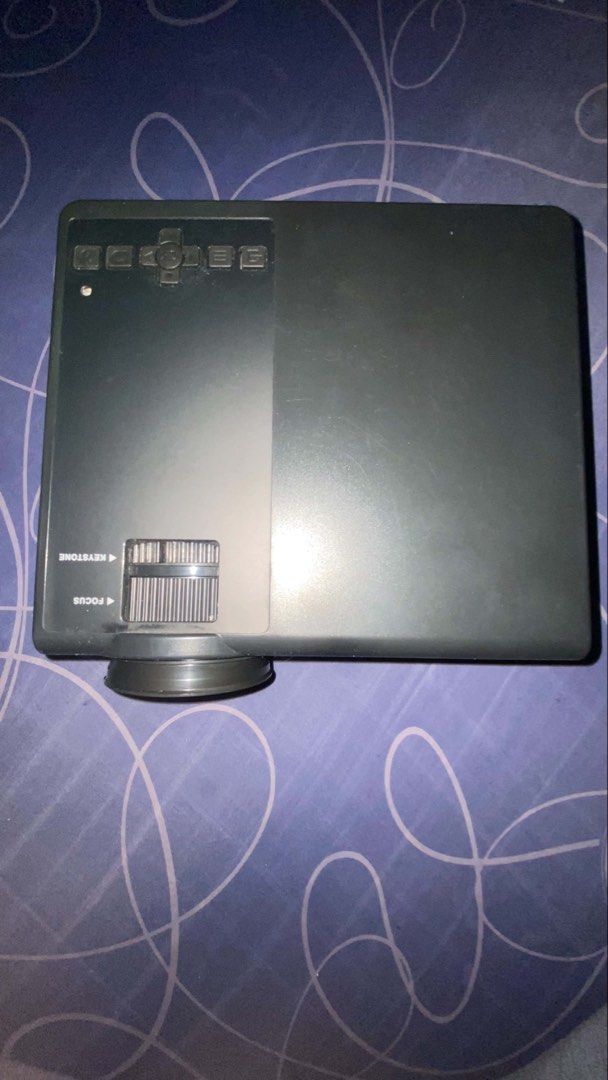 SUNYS Smart Projector (Category: Projectors) located in Manila. Submitted by r_vmvnd (Listing ID 1458461092, Image 1). Description: - SUNYS Smart Projector - Ideal for movie nights and presentations - Connectivity: HDMI, USB, AV, VGA ports - Easy focus and keystone adjustment wheels on top - In excellent working condition.