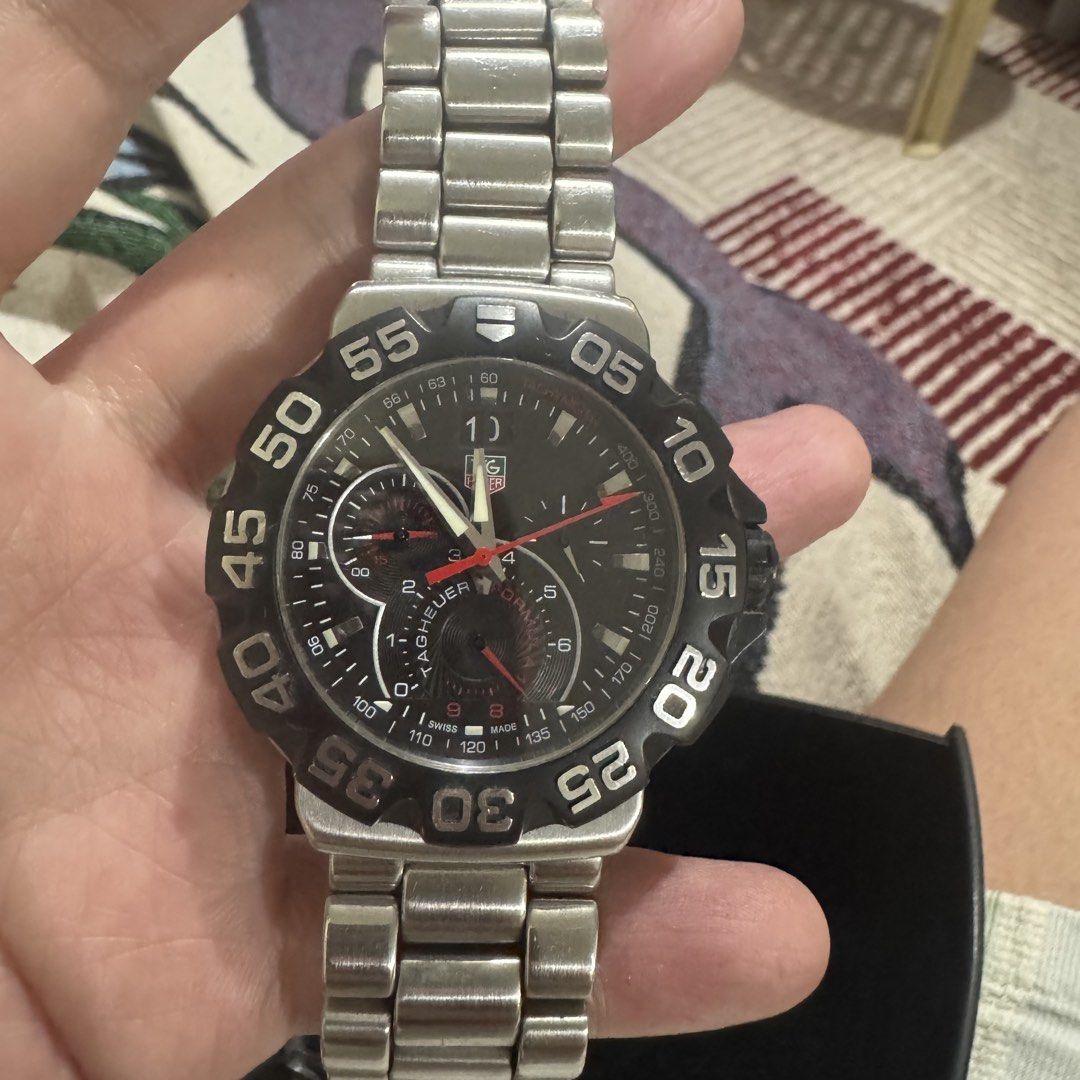 Rush Sale TAG Heuer Formula 1 Chronograph Men's Watch (Category: Men's Watches) located in Manila. Submitted by personalprelovedmnl (Listing ID 1458461969, Image 2). Description: - Authentic TAG Heuer Formula 1Chronograph - CAH1010 -44mm dial - Unpolished - Comes with original TAG Heuer watch box.