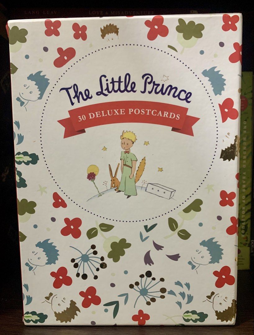 The Little Prince 30 Deluxe Postcards (Category: Storybooks) located in Valenzuela. Submitted by preloved_by_poshspeiz (Listing ID 1458459680, Image 1). Description: The Little Prince 30 Deluxe Postcards - This pre-loved beautiful box contains 30 collectible, frameable, and mailable deluxe postcards. - Complete with never used 30 postcards. Stored in my bookshelf because it’s so pretty to look at. - There are very minimal sign of storage - Price 
