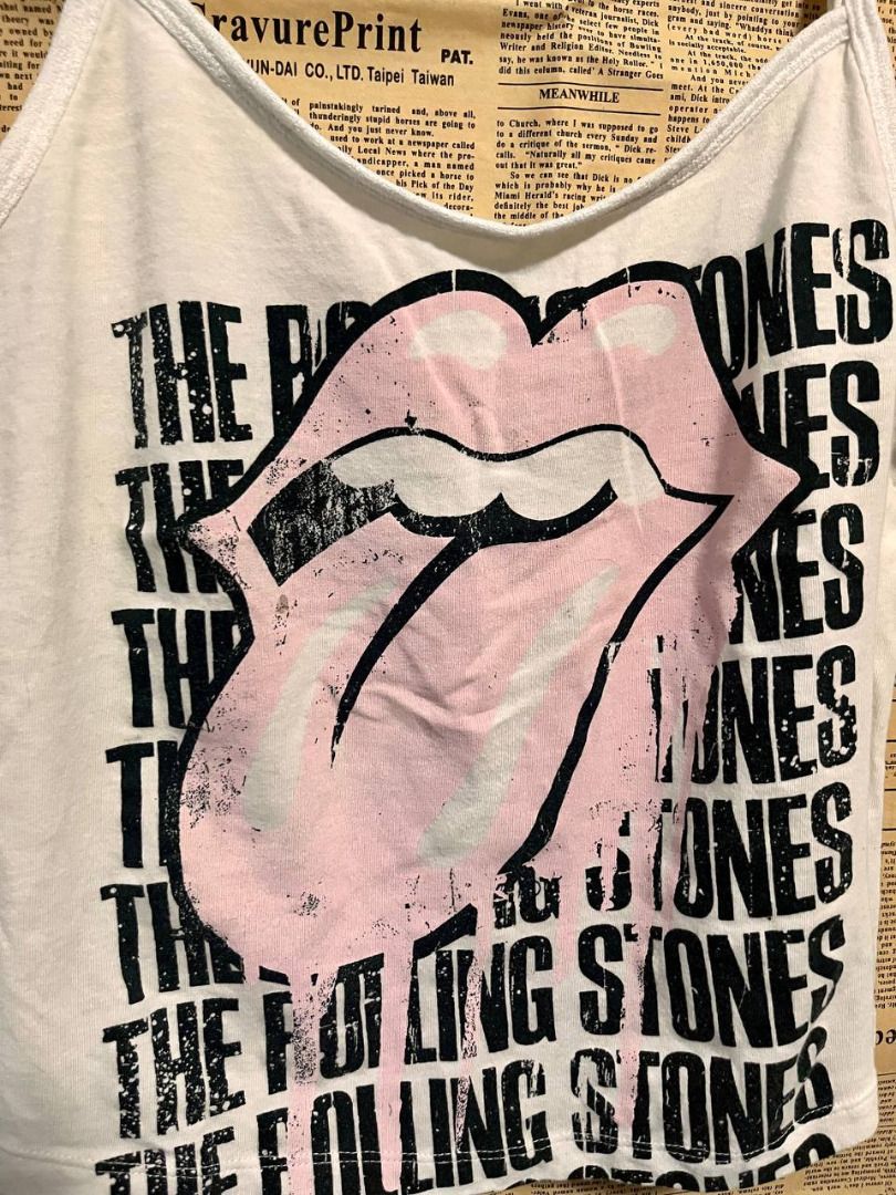 The Rolling Stones Graphic Tank Top (Category: Sleeveless) located in Paranaque City. Submitted by littledairyqueen (Listing ID 1458473617, Image 3). Description: 🎸 THE ROLLING STONES GRAPHIC CAMI TOP FOR SALE 🎸 Brand: The Rolling Stones Color: White / Pink / Black Style: Spaghetti strap / cami top Size: Small-Medium Condition: Pre-loved / Good condition ✨ Iconic Rolling Stones tongue graphic ✨ Cute Y2K / vintage rock-inspired piece ✨ Perfect f