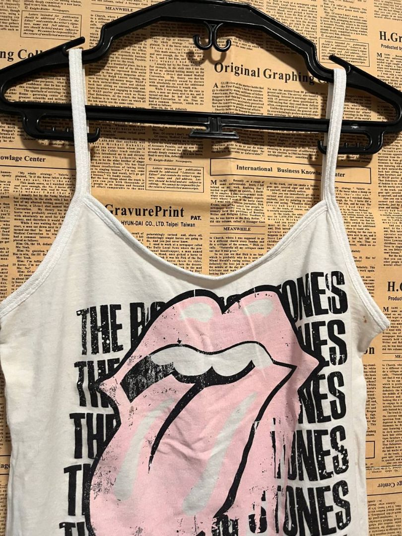 The Rolling Stones Graphic Tank Top (Category: Sleeveless) located in Paranaque City. Submitted by littledairyqueen (Listing ID 1458473617, Image 2). Description: 🎸 THE ROLLING STONES GRAPHIC CAMI TOP FOR SALE 🎸 Brand: The Rolling Stones Color: White / Pink / Black Style: Spaghetti strap / cami top Size: Small-Medium Condition: Pre-loved / Good condition ✨ Iconic Rolling Stones tongue graphic ✨ Cute Y2K / vintage rock-inspired piece ✨ Perfect f