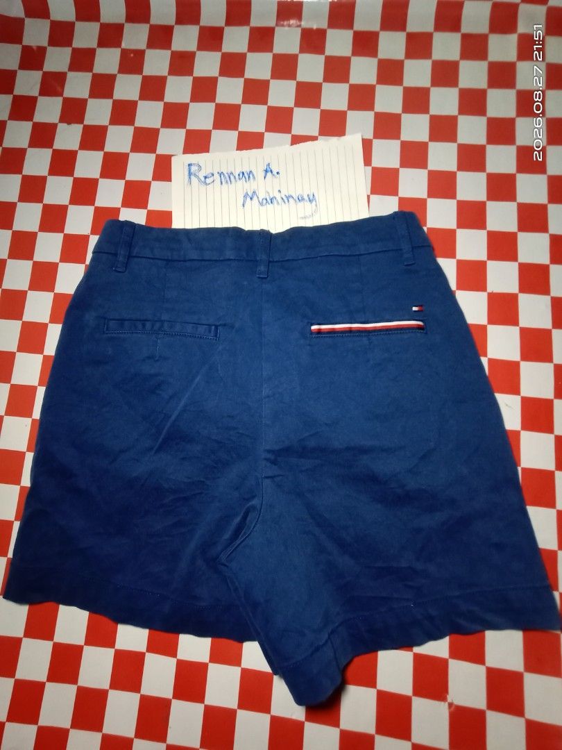 Tommy Hilfiger Blue Chino Shorts (Category: Shorts) located in Danao, Cebu. Submitted by rennan.546 (Listing ID 1458454831, Image 2). Description: tommy Hilfiger excellent condition issue none color rate 9.9/10 dimention 26x14 +ship loc pagutlan maslog danao city Cebu city - Brand: Tommy Hilfiger - Color: Blue - Style: Chino Shorts - Fit: Classic - Closure: Button and zip - Pockets: Two side pockets, two back pockets - Special Detail: One back po