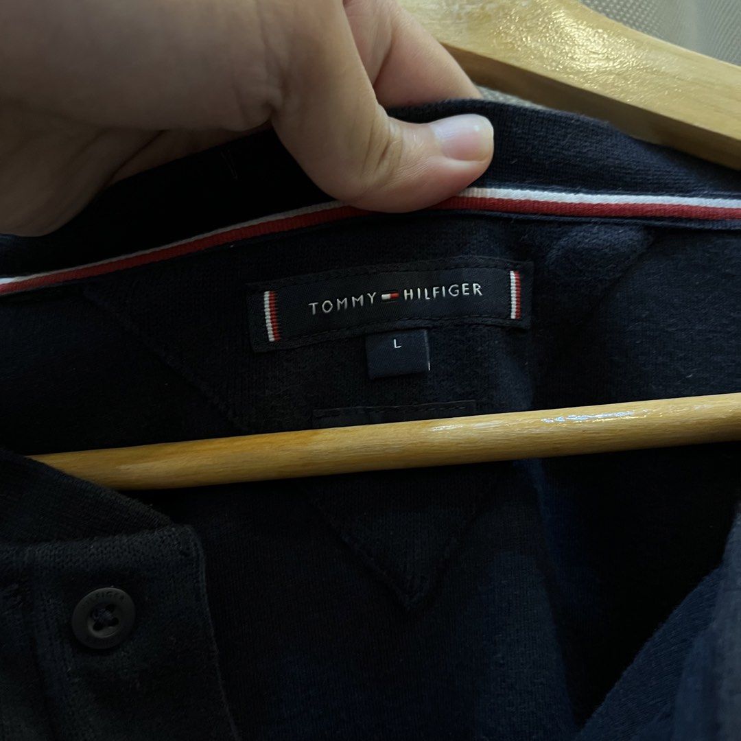 Tommy Hilfiger henley sweater (Category: Coats, Jackets and Outerwear) located in Marikina City. Submitted by wiseoptions (Listing ID 1458406140, Image 2). Description: Tommy Hilfiger henley sweater Dark Blue- 9.5/10 L on tag- 23x27 Excellent condition.