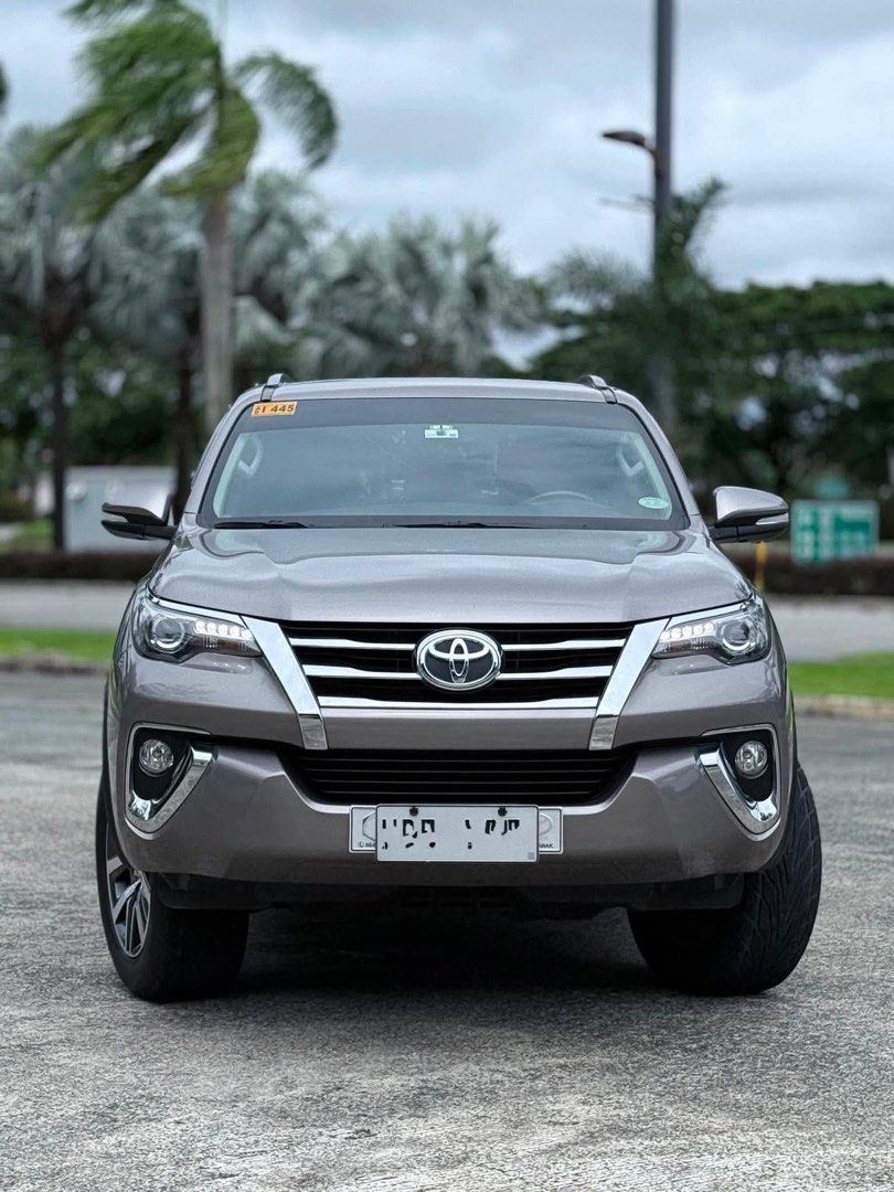 Toyota Fortuner V Auto (Category: Used Cars) located in Manila. Submitted by quality_cars (Listing ID 1458401711, Image 1). Description: FOR SALE‼️ 2017 Toyota Fortuner V Price: 1.045m 🔥SUPER FRESH SUV W/ 38K MILEAGE ONLY🔥 For sale Cash / Financing / Trade-in ✅ Class type : SUV Engine : 2.4 ltrs (Diesel) Capacity : 7 seaters Color : Avant-Garde Bronze Metallic Transmision : Automatic 4x2 w/ paddle shift Mileage : 38,+++ ( Unli scan ) -Fresh eng