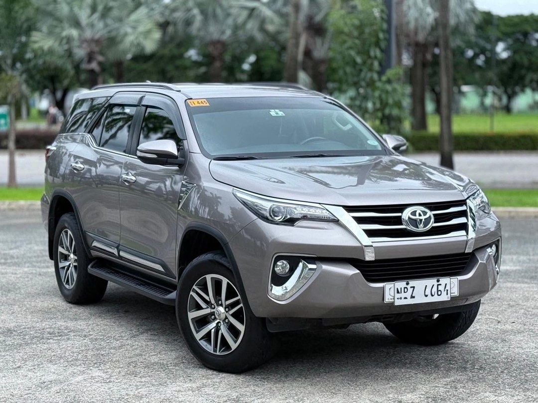 Toyota Fortuner V Auto (Category: Used Cars) located in Manila. Submitted by quality_cars (Listing ID 1458401711, Image 2). Description: FOR SALE‼️ 2017 Toyota Fortuner V Price: 1.045m 🔥SUPER FRESH SUV W/ 38K MILEAGE ONLY🔥 For sale Cash / Financing / Trade-in ✅ Class type : SUV Engine : 2.4 ltrs (Diesel) Capacity : 7 seaters Color : Avant-Garde Bronze Metallic Transmision : Automatic 4x2 w/ paddle shift Mileage : 38,+++ ( Unli scan ) -Fresh eng
