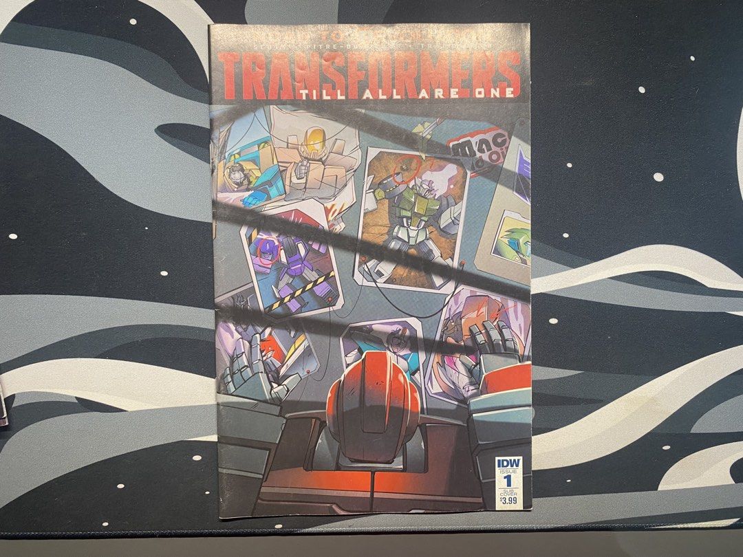 Transformers Till All Are One Issue 1 IDW Comic Book (Category: Comics & Manga) located in Muntinlupa City. Submitted by viniethebeanie (Listing ID 1458328307, Image 1). Description: - Transformers Till All Are One comic book - Issue #1 - Published by IDW - Original Cover Price: $3.99 - Perfect for any Transformers collection.
