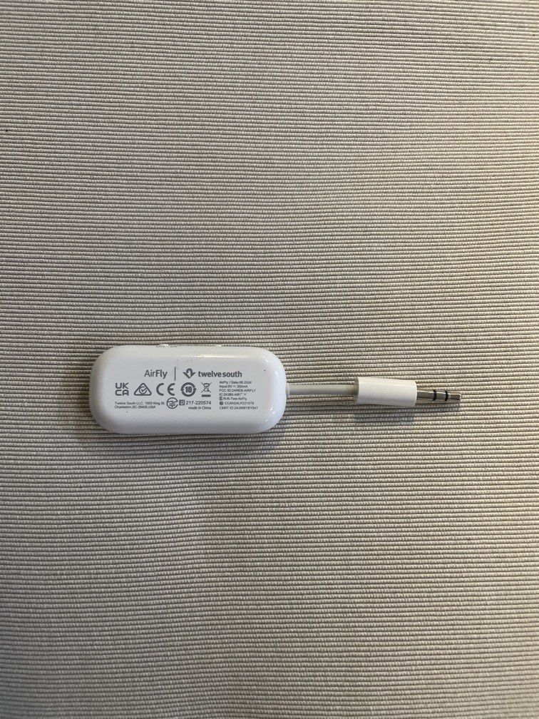 Twelve South AirFly SE Wireless Transmitter — White (Category: Other Audio Equipment) located in Las Pinas. Submitted by yourneighbortotoro (Listing ID 1458354737, Image 2). Description: Twelve South AirFly SE Wireless Transmitter — White ✨ The newest entry-level travel adapter from Twelve South — easily link your wireless earbuds to 3.5mm headphone jacks. 📚 Perfect for frequent flyers, gym goers, travel tech kit owners, and AirPods users 🔹 Bra