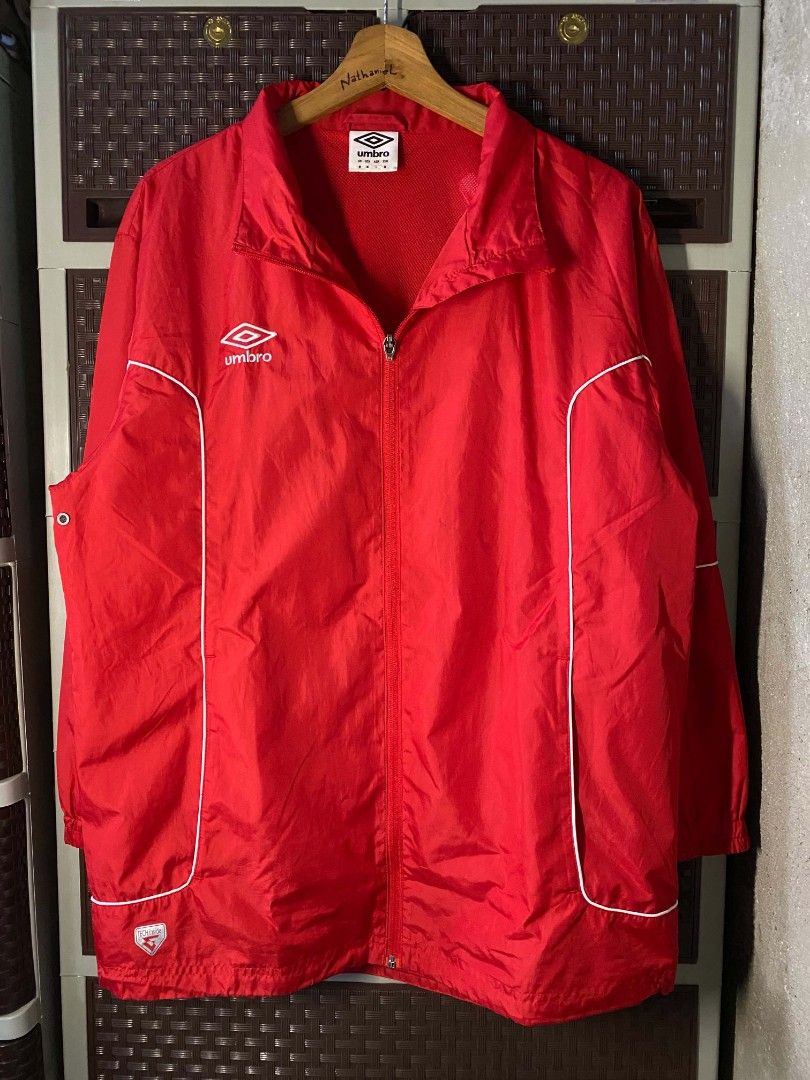 Umbro Women's Red Raining Jacket. (Category: Coats, Jackets and Outerwear) located in Cabanatuan. Submitted by vivian_nicole_03 (Listing ID 1458391261, Image 1). Description: Dimensions: 20x27 Issue : zipper but it's fine.