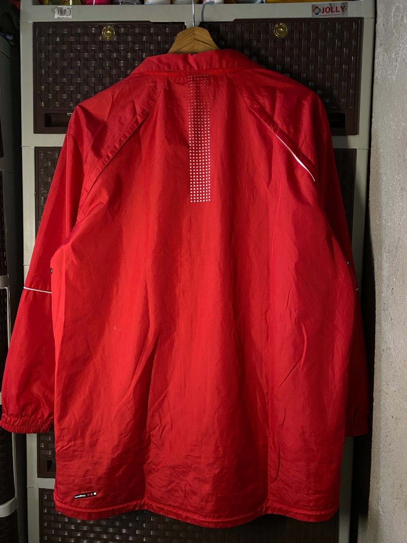 Umbro Women's Red Raining Jacket. (Category: Coats, Jackets and Outerwear) located in Cabanatuan. Submitted by vivian_nicole_03 (Listing ID 1458391261, Image 2). Description: Dimensions: 20x27 Issue : zipper but it's fine.