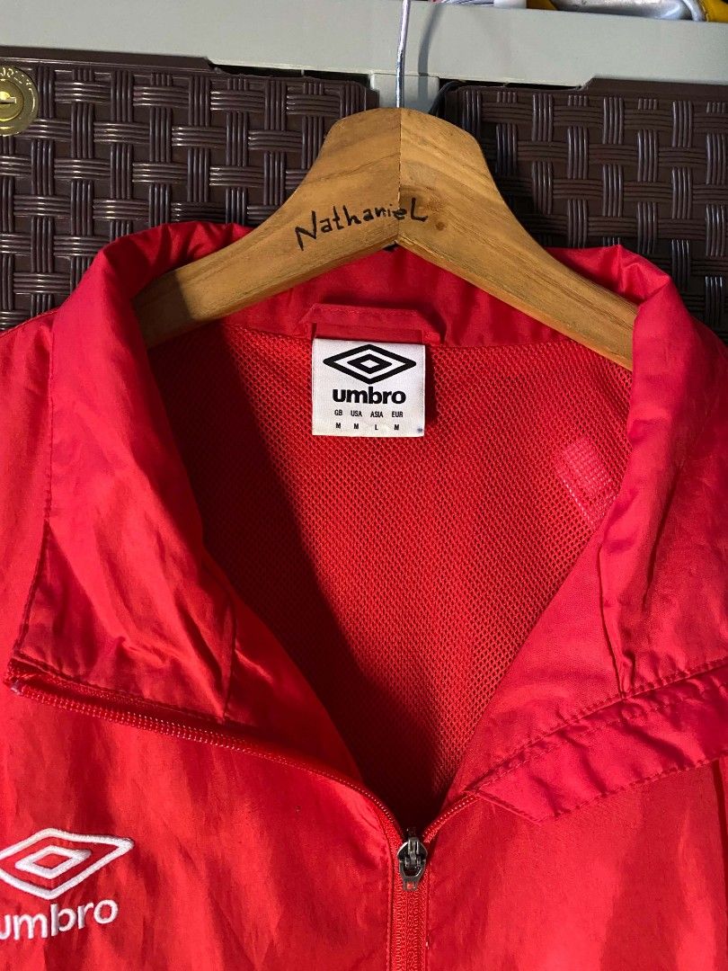 Umbro Women's Red Raining Jacket. (Category: Coats, Jackets and Outerwear) located in Cabanatuan. Submitted by vivian_nicole_03 (Listing ID 1458391261, Image 3). Description: Dimensions: 20x27 Issue : zipper but it's fine.