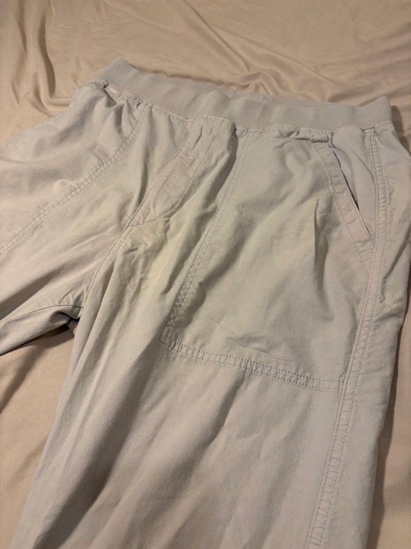 Uniqlo Grey Utility Jogger Pants (Category: Joggers) located in Baguio. Submitted by wandering_trader (Listing ID 1458474406, Image 3). Description: Dimensions: Waist: 27-34 Opening: 4.5-7 Thigh: 11.5 Rise: 12 Inseam: 27 Outseam: 39 Condition: 8.5/10; missing drawstring.