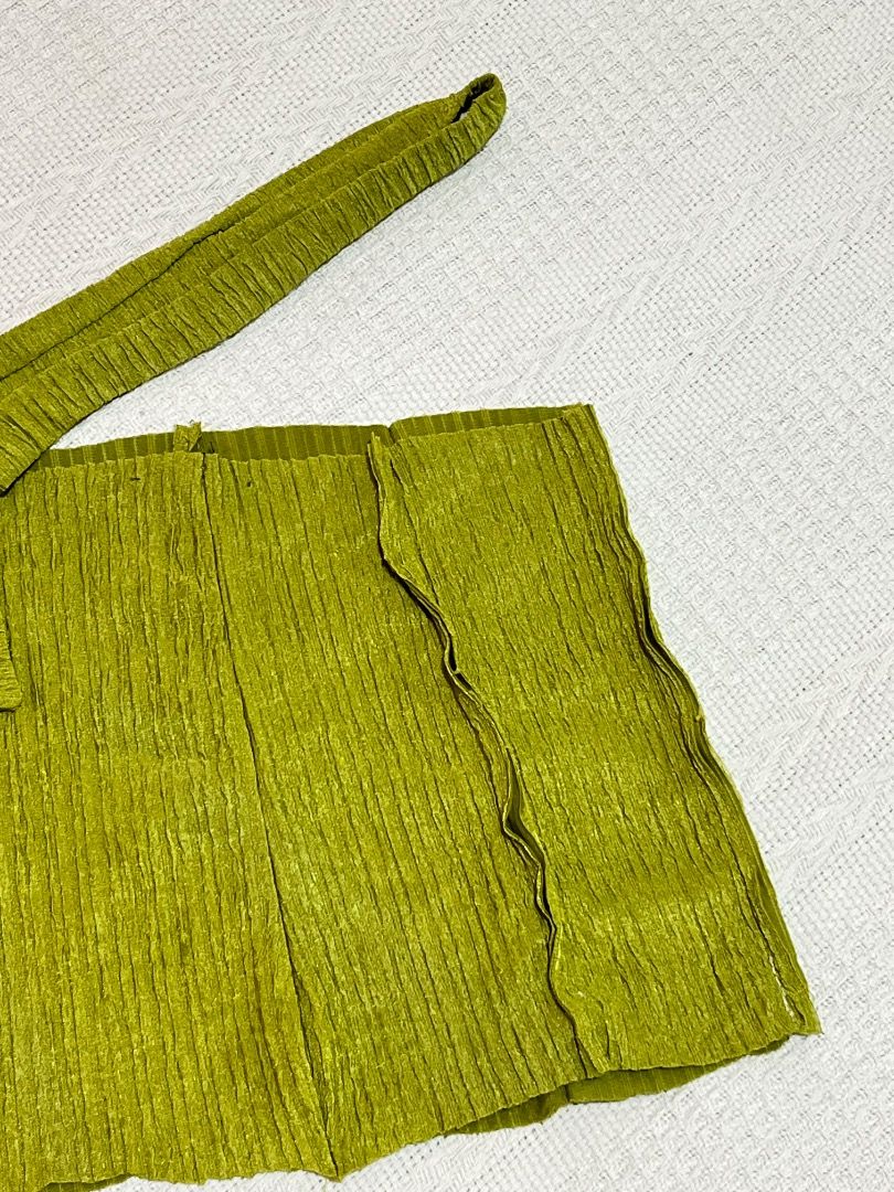 Unique Green Textured Bag with Single Strap (Category: Cross-body Bags) located in Santa Rosa. Submitted by rsxyen (Listing ID 1458425436, Image 3). Description: - Unique cool green bag - Textured, crinkled fabric effect - Single strap - Button detail on the front - Adds a pop of color to any outfit - Approx. [insert width] W x [insert height] H.