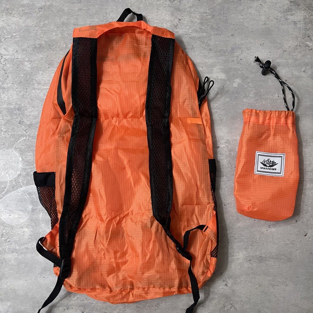 VANAHGIMR Orange Lightweight Foldable Hiking Backpack (Category: Backpacks) located in General Trias. Submitted by abellu (Listing ID 1458414451, Image 3). Description: -NEW never used -Orange foldable backpack from VANAHGIMR - Folds into a small pouch for easy storage - Features mesh side pockets - Includes zippered compartments - Ideal for travel or everyday use - Lightweight and compact design.