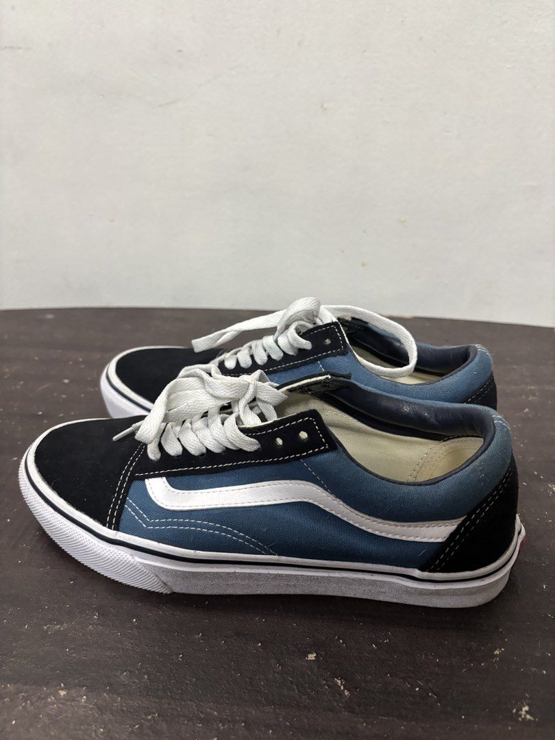 Vans Old Skool Blue Black White Sneakers (Category: Sneakers) located in Las Pinas. Submitted by Swucie.items (Listing ID 1458351717, Image 3). Description: This item was used with care <3 Feel free to ask for more details! ~ ੈ✩‧₊˚Please check my other items ੈ✩‧₊˚ - Classic Vans Old Skool sneakers - Blue canvas with black suede accents - Iconic white side stripe - White laces and rubber sole - Perfect for everyday wear - Shows some signs of use, 