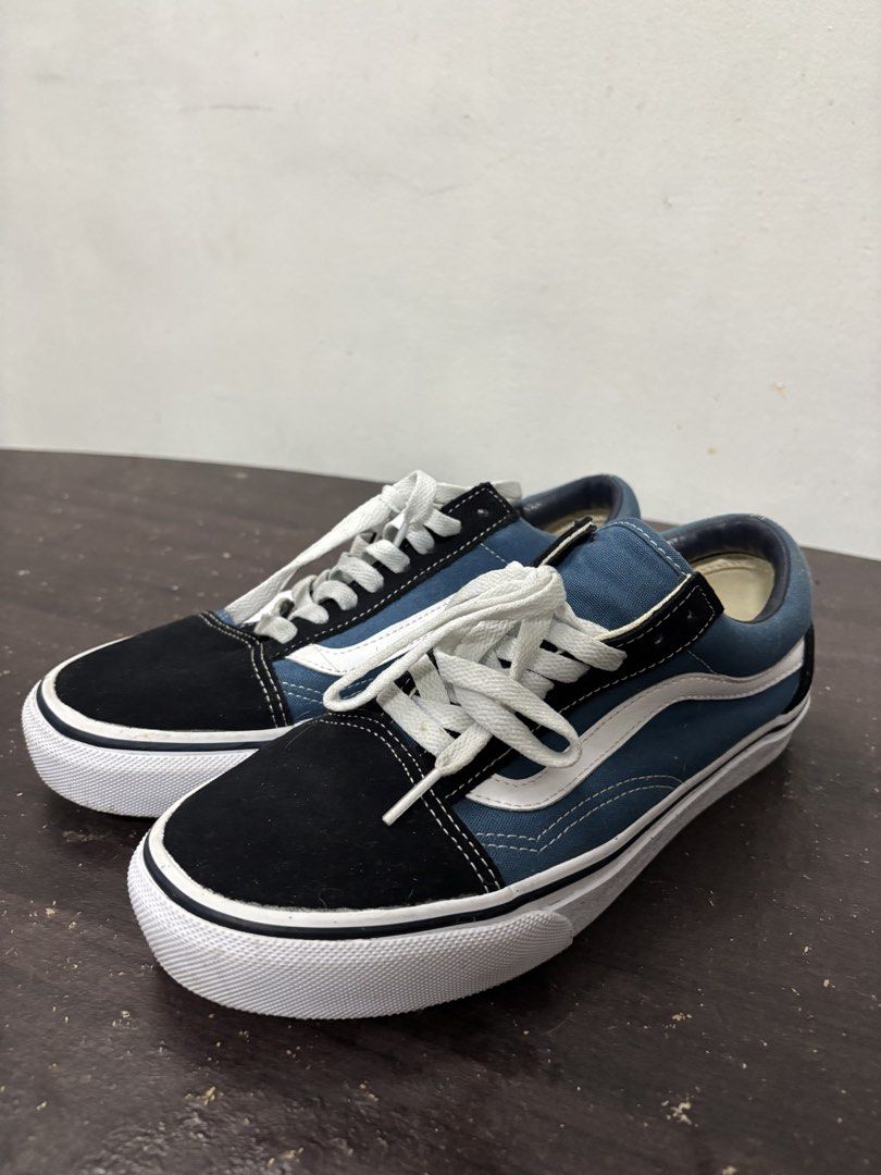 Vans Old Skool Blue Black White Sneakers (Category: Sneakers) located in Las Pinas. Submitted by Swucie.items (Listing ID 1458351717, Image 1). Description: This item was used with care <3 Feel free to ask for more details! ~ ੈ✩‧₊˚Please check my other items ੈ✩‧₊˚ - Classic Vans Old Skool sneakers - Blue canvas with black suede accents - Iconic white side stripe - White laces and rubber sole - Perfect for everyday wear - Shows some signs of use, 
