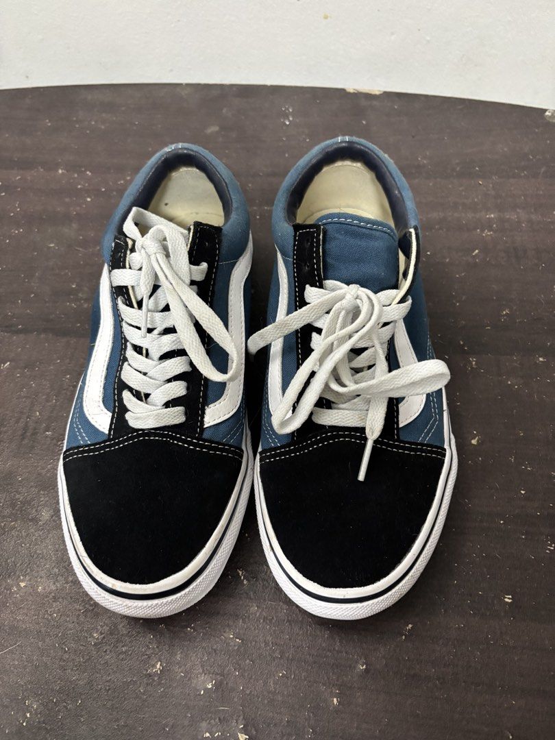 Vans Old Skool Blue Black White Sneakers (Category: Sneakers) located in Las Pinas. Submitted by Swucie.items (Listing ID 1458351717, Image 2). Description: This item was used with care <3 Feel free to ask for more details! ~ ੈ✩‧₊˚Please check my other items ੈ✩‧₊˚ - Classic Vans Old Skool sneakers - Blue canvas with black suede accents - Iconic white side stripe - White laces and rubber sole - Perfect for everyday wear - Shows some signs of use, 