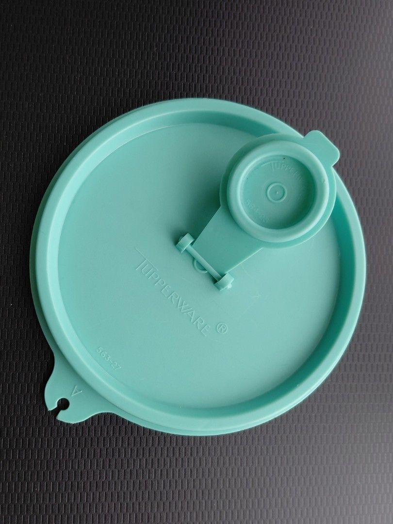 VINTAGE Tupperware Liquid Dispenser Pitcher (Category: Food Organization & Storage) located in Quezon City. Submitted by girldolphin (Listing ID 1458384774, Image 2). Description: This is a used item, please manaage expectations. Measurements: - 8 inches tall; - 4 inches wide Mode of Payment: BPI GCASH Maribank Near Amoranto Sports Complex, Timog, Morato.