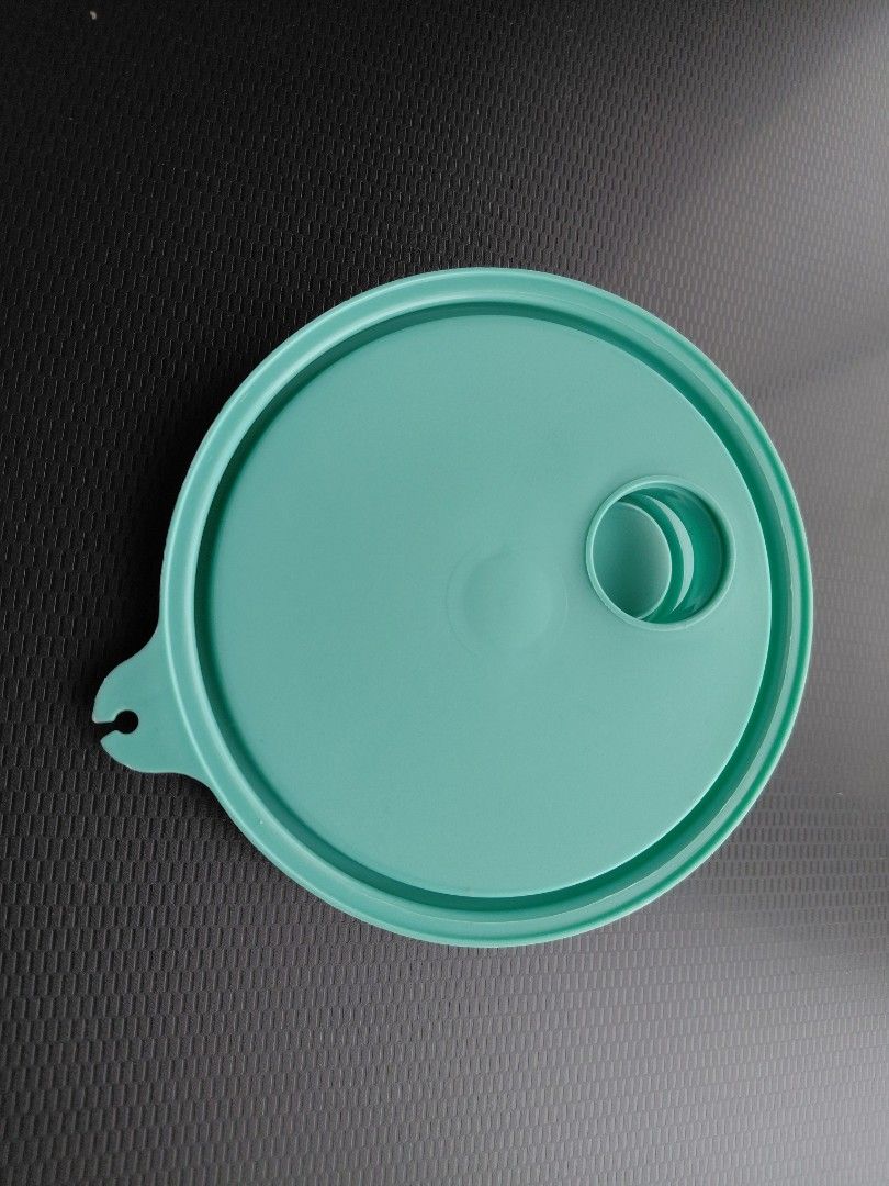 VINTAGE Tupperware Liquid Dispenser Pitcher (Category: Food Organization & Storage) located in Quezon City. Submitted by girldolphin (Listing ID 1458384774, Image 3). Description: This is a used item, please manaage expectations. Measurements: - 8 inches tall; - 4 inches wide Mode of Payment: BPI GCASH Maribank Near Amoranto Sports Complex, Timog, Morato.