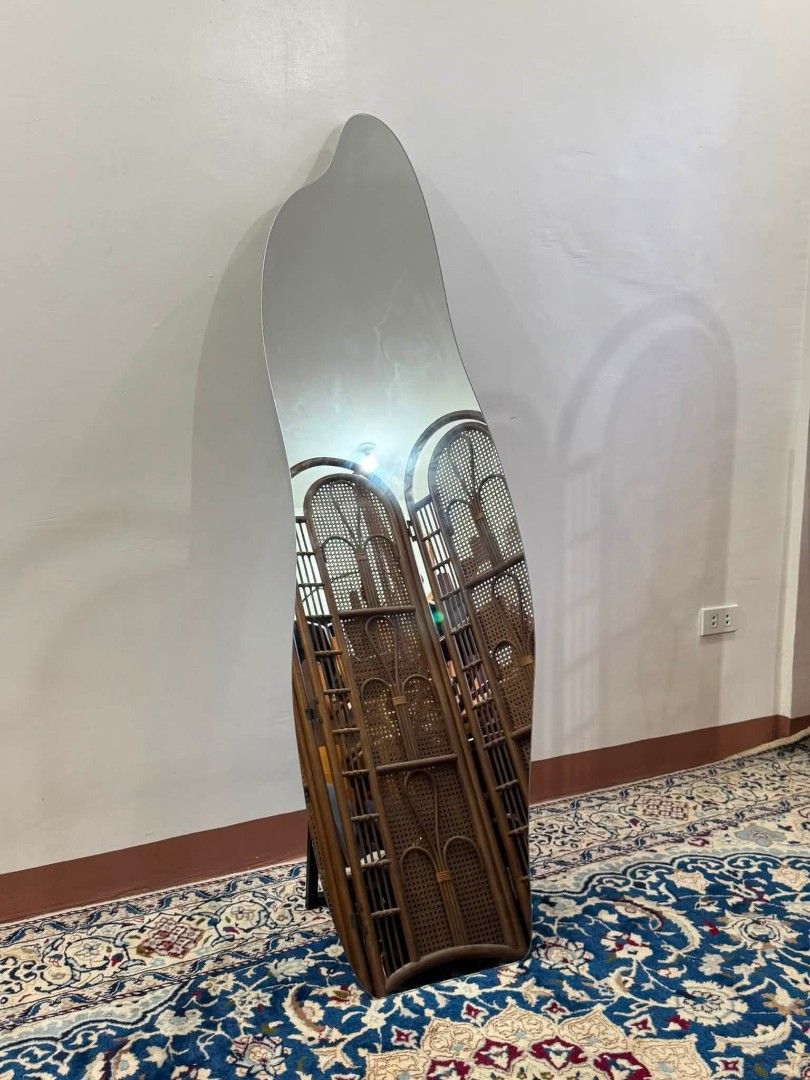 Wavy Full Length Floor Mirror Stand (Category: Mirrors) located in Quezon City. Submitted by dannikkishoppe2 (Listing ID 1458410900, Image 3). Description: Wavy Full Length Floor Mirror Stand ‼️₱5000‼️ In good condition H: 63 W: 19 inches • Modern, irregular shape adds a stylish touch • Perfect for bedrooms or living rooms • Includes a sturdy black stand • Great for daily use or as a decorative accent Please manage your expectations as there migh