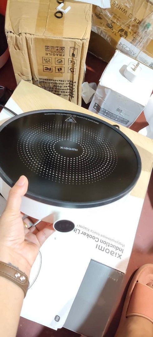 Xiaomi Induction Cooker Lite EU (Category: Cookers) located in Manila. Submitted by lilyappliance (Listing ID 1458338053, Image 3). Description: - Xiaomi Induction Cooker Lite EU - Powerful 2100W - Automatic overheating protection - Flashing LED lights for alerts - Precise heat control knob - 1-year Xiaomi official warranty - Daily free shipping available.