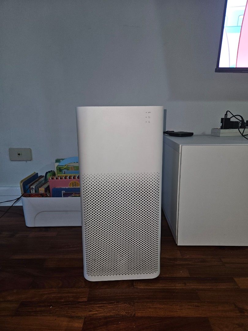 Xiaomi Mi Air Purifier (Category: Air Purifiers & Dehumidifiers) located in Makati City. Submitted by ryanscloset (Listing ID 1458323382, Image 1). Description: - White Xiaomi Mi Air Purifier - Sleek and modern design - Effectively cleans the air in your home - Simple and intuitive controls on top - Ideal for bedrooms or living rooms - Selling because I'm moving.
