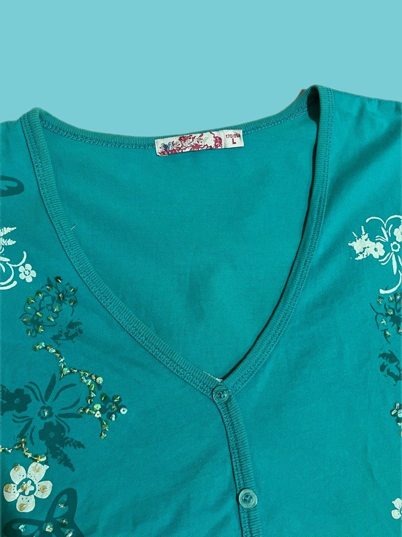 y2k turquoise flower sequin whimsy top (Category: Blouses) located in Iligan City. Submitted by miaepples (Listing ID 1458369943, Image 3). Description: fast ship out! mod: jnt direct mop: gcash/mari.