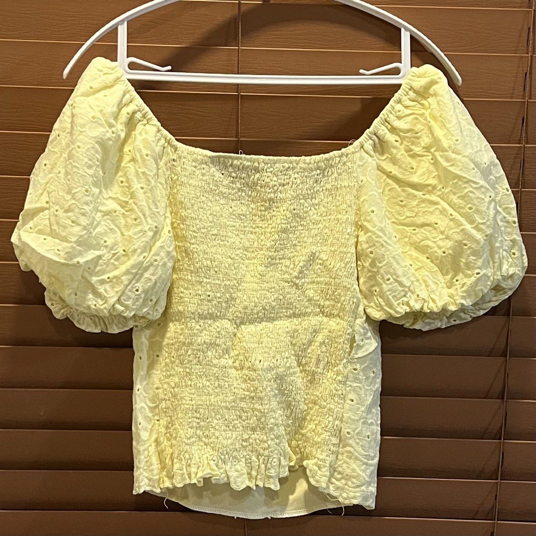 Yellow Eyelet Puff Sleeve Square Neck Top (Category: Blouses) located in Makati City. Submitted by declutterine95 (Listing ID 1458480368, Image 2). Description: 📍I am based in Makati 💡 Color may vary slightly due to lighting 🤍 Please manage expectations (preloved items) 📩 Message for more photos/measurements 🚚 Shipping shouldered by buyer.
