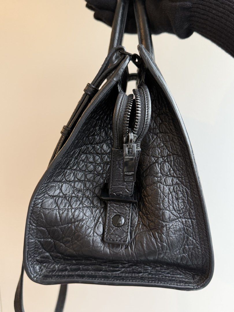 YSL Monogram Cabas Croc (Category: Luxury Bags & Wallets) located in Makati City. Submitted by theladyluxxe (Listing ID 1458441030, Image 2). Description: 🏷️ P60k YSL Cabas Croc Embossed ✨ RANK A Comes with strap cards & dust bag Can be worn top handle or crossbody 💳 MOP: BPI/Bank Transfer/Gcash/Maya/Paypal DISCLAIMER: theladyluxxe is NOT AFFILIATED with any brand posted on this page. All rights, trademarks, and copyrights remain the property o