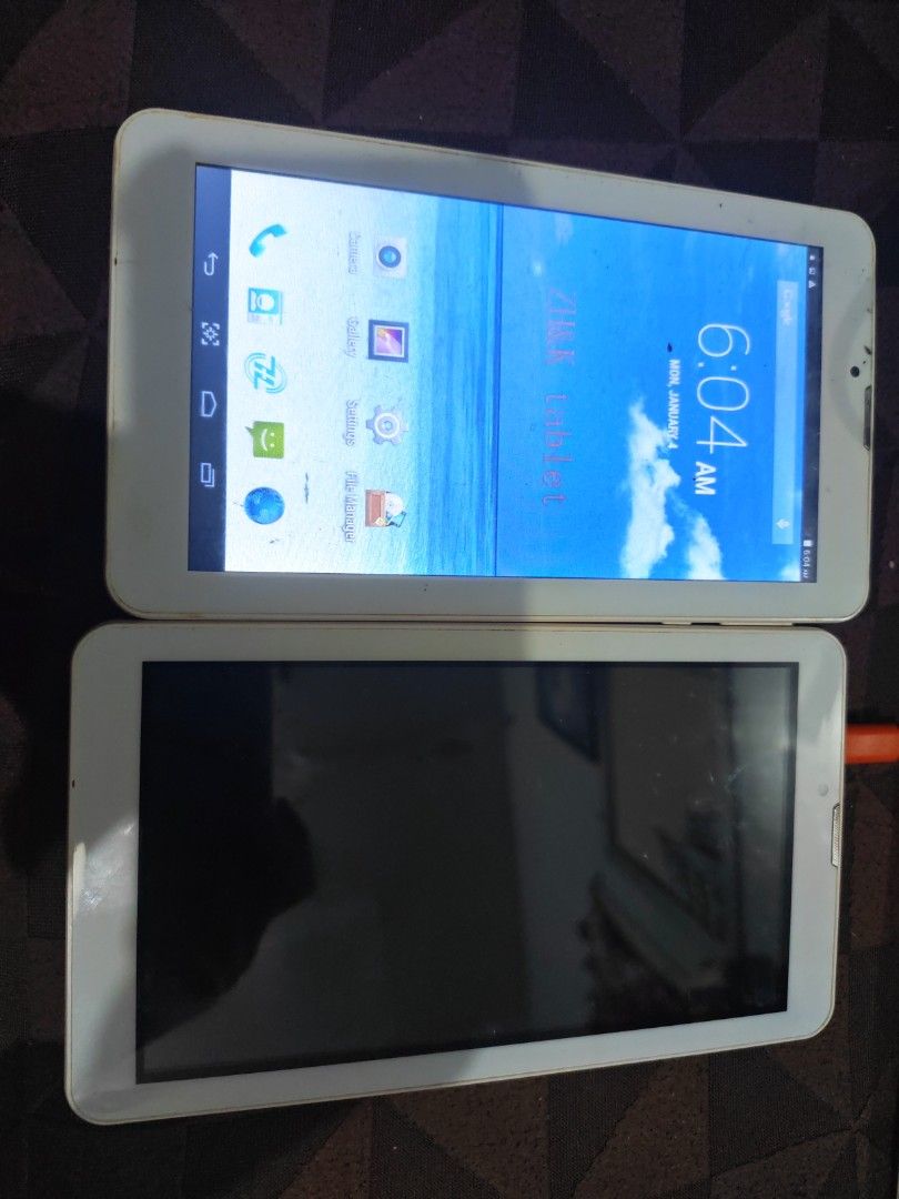 ZH&K TABLET (Category: Android) located in Pasig City. Submitted by cahrllene (Listing ID 1458312432, Image 1). Description: yung isa nag oopen, yung isa super drain ata battery kaya ayaw mag open, with sim card na din para pwede pang text & call. 400 nalang each, mga naka tambak nalang kasi sa bahay.