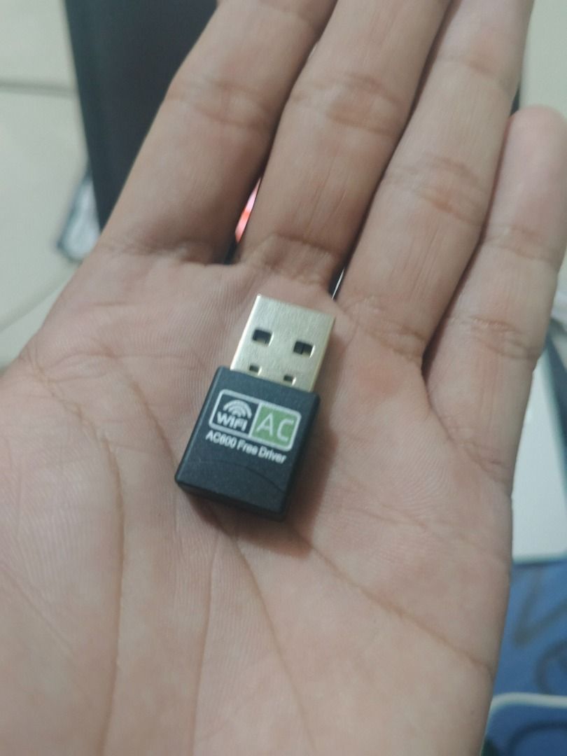 AC800 WiFi USB Adapter - Free Driver (Category: Cables & Adaptors) located in Nabunturan. Submitted by johnzedric36131 (Listing ID 1453559538, Image 2). Description: - Small USB WiFi Adapter (Model AC800) - Supports fast WiFi AC standard - Plug and Play: No driver installation needed - Instantly adds WiFi to desktops or laptops - Compact and portable design.