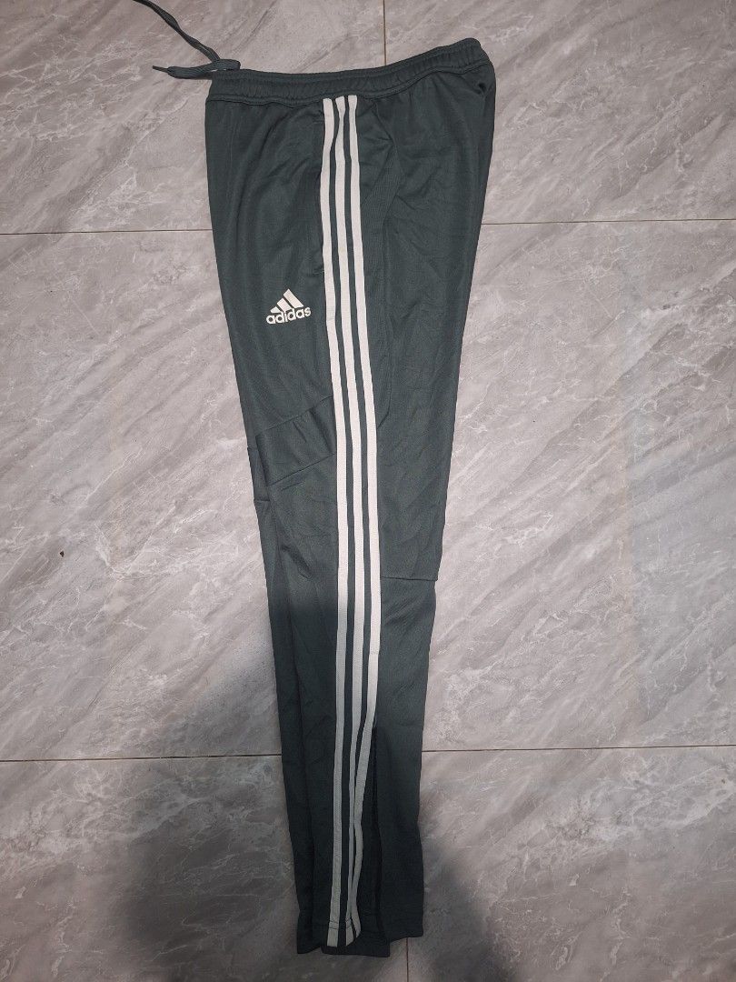 Adidas Tiro Jogger Pants Unisex (Category: Activewear) located in Palayan City. Submitted by erae_lf (Listing ID 1453445937, Image 3). Description: No issue Like new 10/10 overall condition Army green color with zipper on side hem Size S on tag Waist 29-32" Length 38.5" Inseam 30" Thigh 11" With zipper opening Location Palayan City Nueva Ecija.