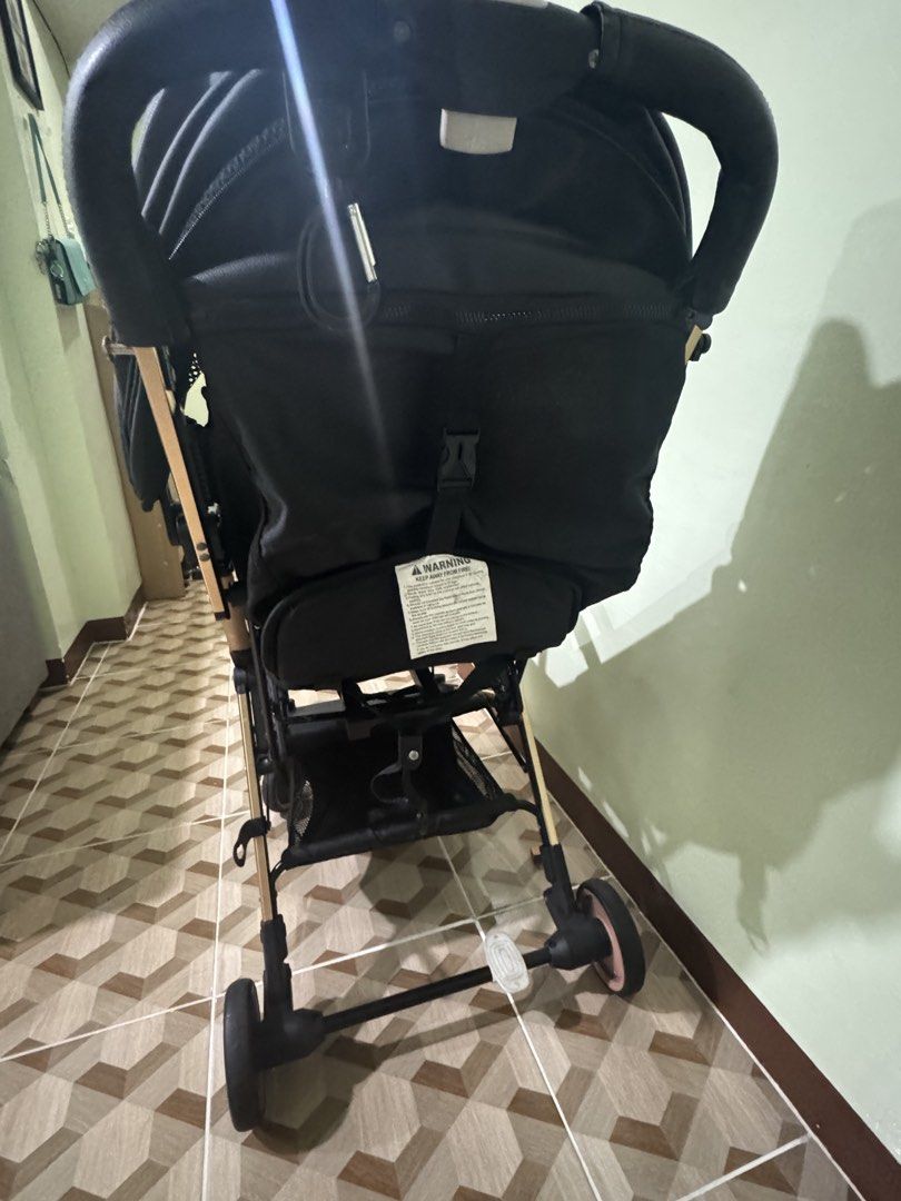 Akeeva X Evenflo (Esmio Gold) (Category: Strollers) located in Taytay. Submitted by rapdelcastillo (Listing ID 1453570434, Image 3). Description: Original Price: 9k+ Rate: 8.9/10 - Lightweight stroller in black with elegant gold accents. - Effortless folding mechanism for easy transport and storage. - Secure 5-point harness for your child's safety. - Adjustable canopy offers ample sun protection. - Convenient storage basket for essentials. - Idea