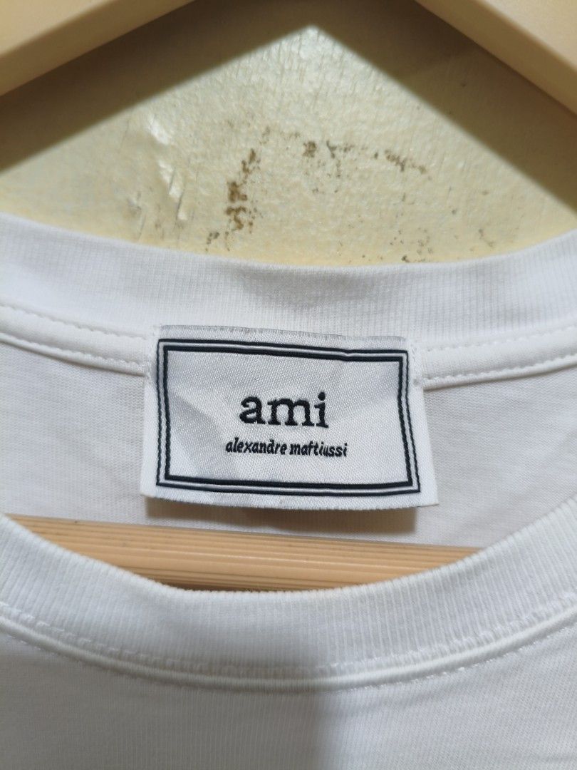 Ami t-shirt (Category: Activewear) located in Manila. Submitted by randomitemsss (Listing ID 1453557541, Image 3). Description: excellent condition need wash color rate 10/10 cut washtag 19x26.