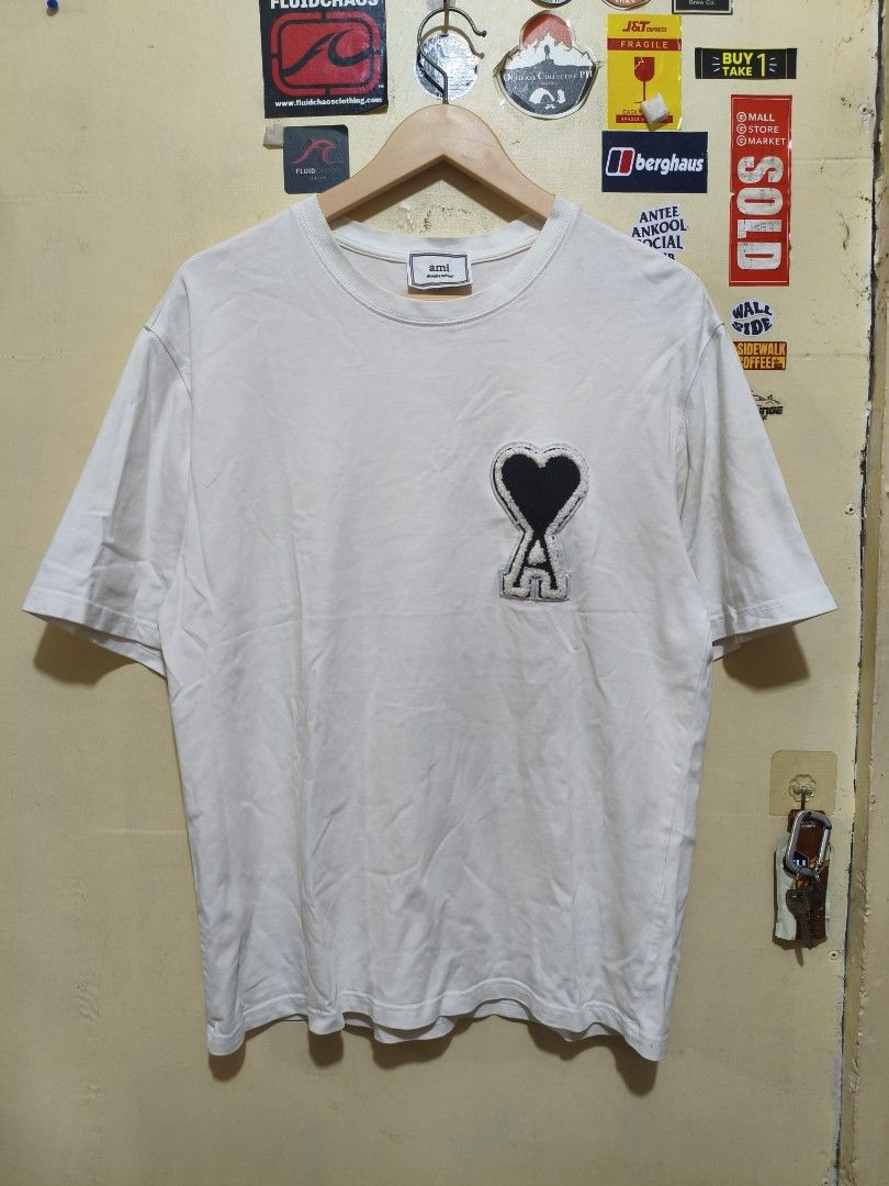 Ami t-shirt (Category: Activewear) located in Manila. Submitted by randomitemsss (Listing ID 1453557541, Image 1). Description: excellent condition need wash color rate 10/10 cut washtag 19x26.