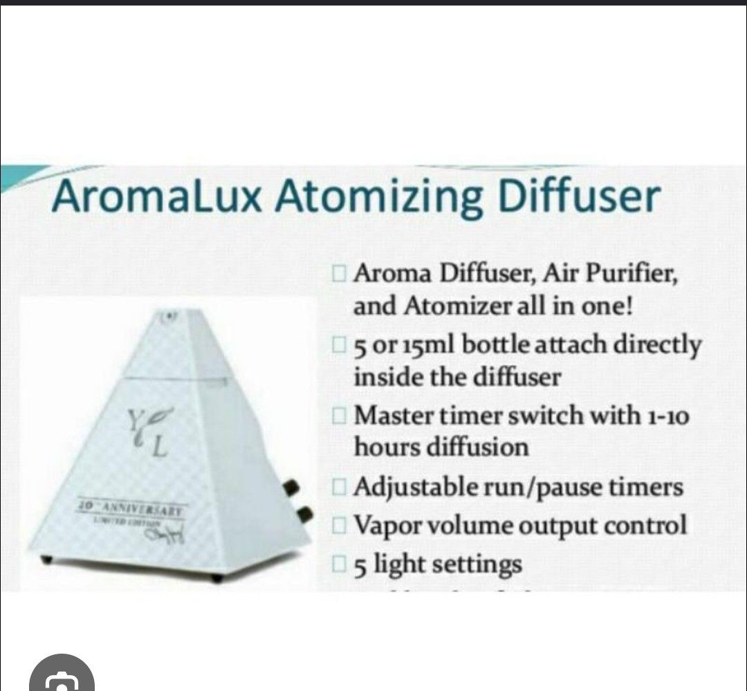 Aromalux Diffuser (Category: Fragrance & Deodorants) located in Singapore. Submitted by myhome99 (Listing ID 1453433271, Image 2). Description: Hey there! Up for grabs is this super cool Young Living Aromalux Atomising Diffuser, a limited edition piece celebrating their 20th anniversary! It's got a unique pyramid design and can function as an aroma diffuser, air purifier, and atomiser all in one. You can pop in either a 5ml or 15ml essential oil 