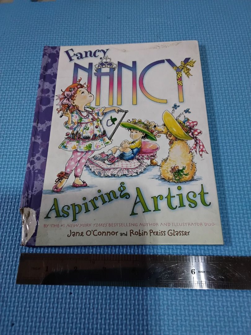 Aspiring Artist - Fancy Nancy (Category: Art & Prints) located in Pasig City. Submitted by rochej (Listing ID 1453478179, Image 1). Description: Nancy's best friend Bree is out of town, and spring vacation is starting to feel totally ordinary. (That is a fancy word for boring!) Luckily, Nancy's mom comes to the rescue with a brand-new set of glitter markers! Watch as Nancy puts her signature flair to très creative use, transforming her blues into
