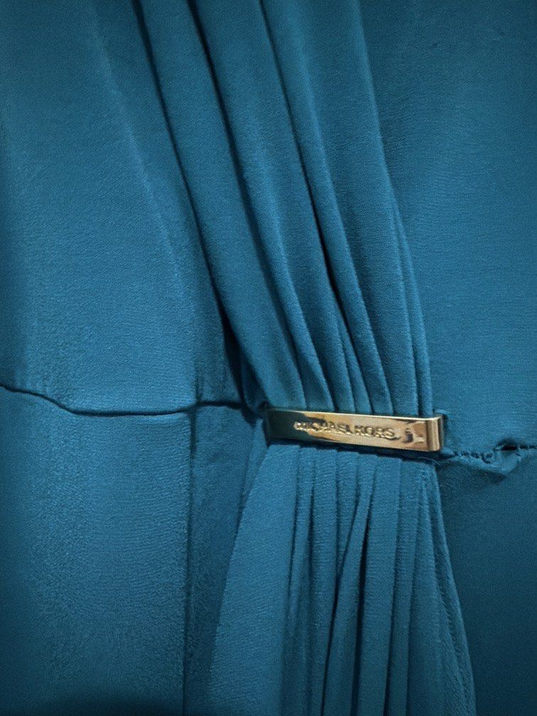 Authentic Michael Kors Teal Dresss (Category: Luxury Apparel) located in Manila. Submitted by pachoooli (Listing ID 1453566795, Image 2). Description: With flaw need stitching other than that the item is good.
