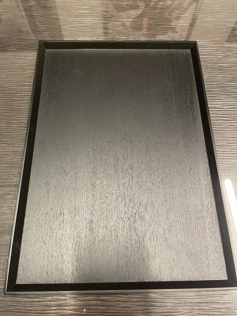 Black rectangular serving tray (Category: Other Kitchenware & Tableware) located in Singapore. Submitted by buzzlightyear21 (Listing ID 1453460537, Image 1). Description: Black Rectangular wooden serving tray (37.5x26.5cm) Height of slanted walls: 1.5cm.