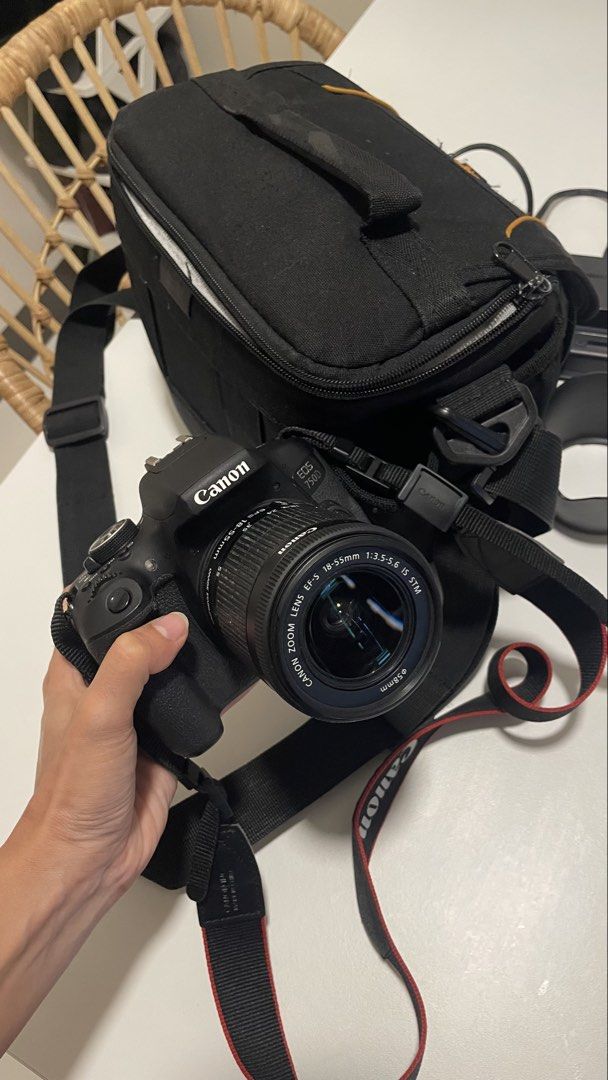 Canon EOS 750D DSLR Camera with Accessories (Category: Cameras) located in Muntinlupa City. Submitted by kshmrbnk (Listing ID 1453430284, Image 1). Description: -Bought in New Zealand - Canon EOS 750D DSLR camera -Touchscreen Display - 18-55mm lens included - Accessories: lens caps, lens hood, charger, battery, camera strap - Includes Lowepro camera bag - Features a flip-out screen - In good working condition, hindi gaano nagamit talaga - Lady Ow