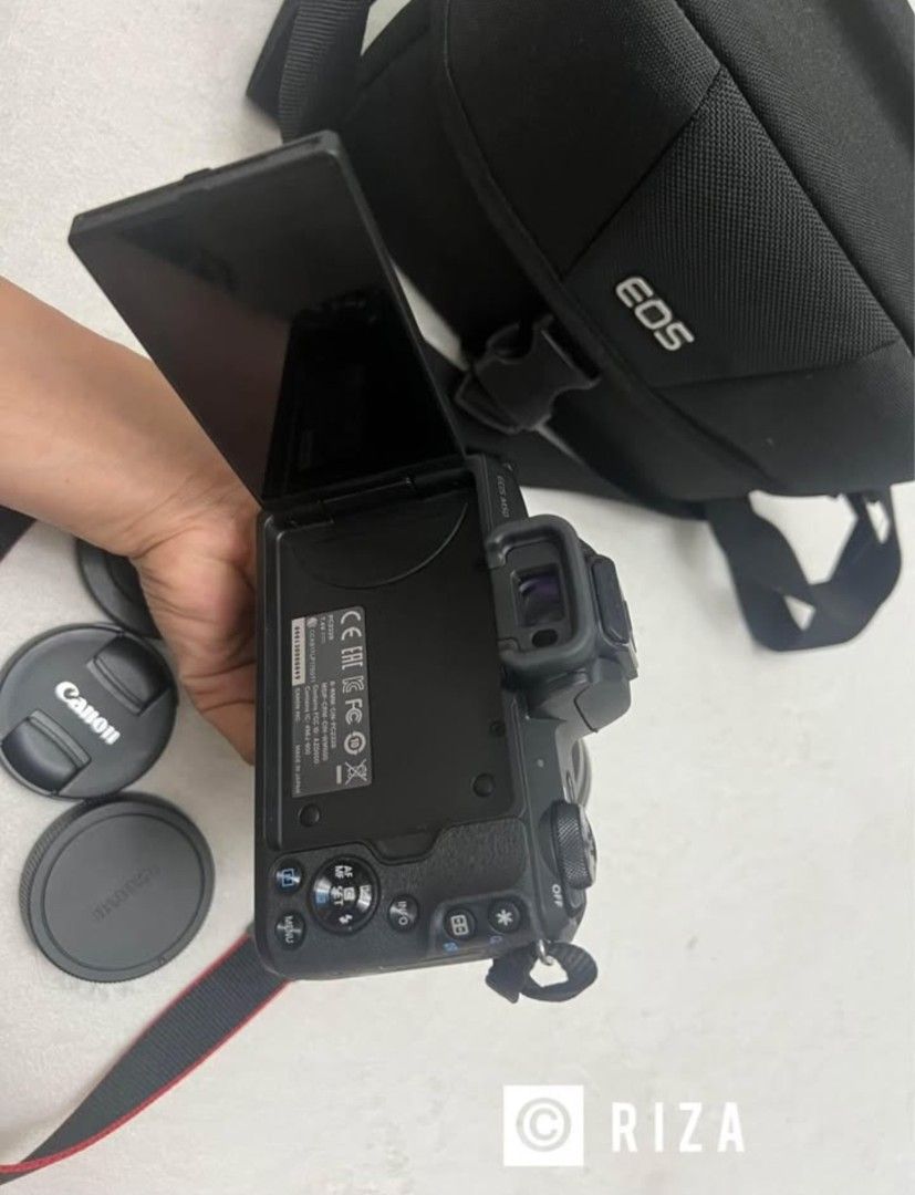 Canon EOS M50 Mirrorless Camera with 18-150mm Lens & Bag (Category: Cameras) located in Manila. Submitted by raeezzza (Listing ID 1453475254, Image 3). Description: - Canon EOS M50 Camera - Versatile 18-150mm Lens - Includes Camera Bag - Remote Shutter Included - Comes with Lens Caps - Tripod Included - Ideal for both Photos and Videos - Ready for your next adventure!.